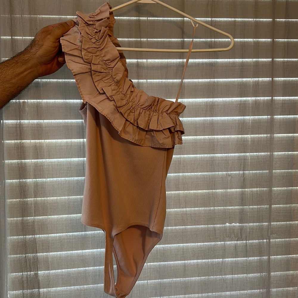 Express brand, one shoulder ballet pink bodysuit. Never worn.